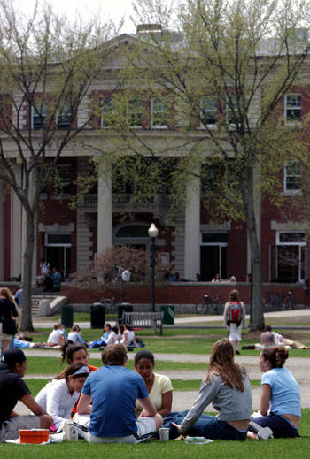 Dartmouth College students relax on the Green with Collis Student Center in the background.  Used with permission.